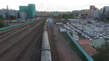 aerial drone station close up following train in mongolia ulan bator sunny day