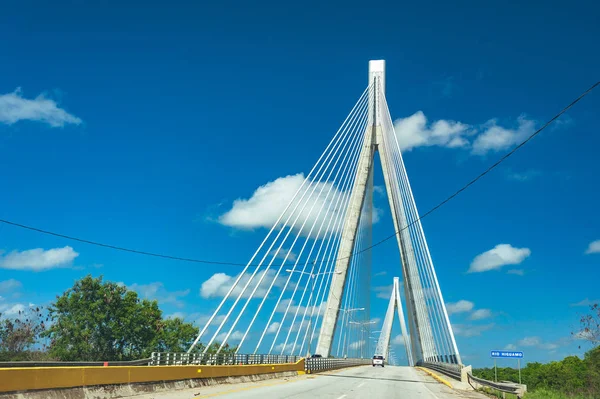 Wonderful white bridge structure over clear blue sky