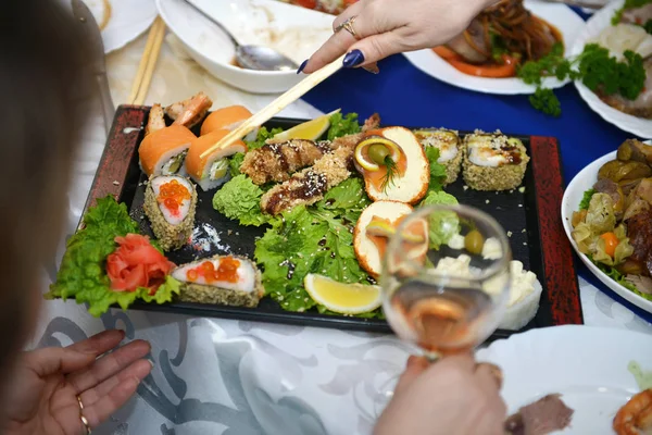 Different appetizer and anti pasti. Fresh tasty seafood served on table. Top view. Close-up. — Stock Photo, Image