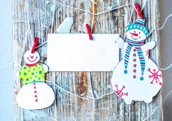 Christmas ornaments on wooden table — Stock Photo, Image