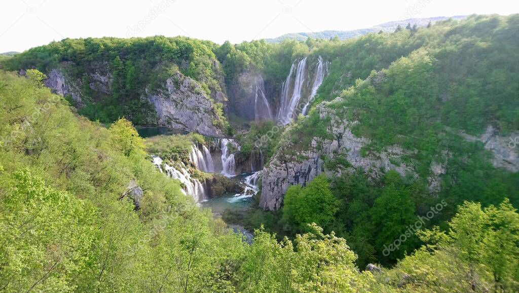 Croatia. Plitvice Lakes. Beautiful waterfalls and lakes inside the forest. colorful water and nature. Power of water