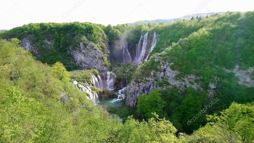 Croatia. Plitvice Lakes. Beautiful waterfalls and lakes inside the forest. colorful water and nature. Power of water