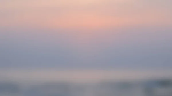 Zonsondergang achtergrond wazig. — Stockfoto