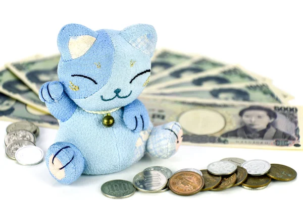 Maneki-neko, the lucky cat and Japanese money. — Stock Photo, Image