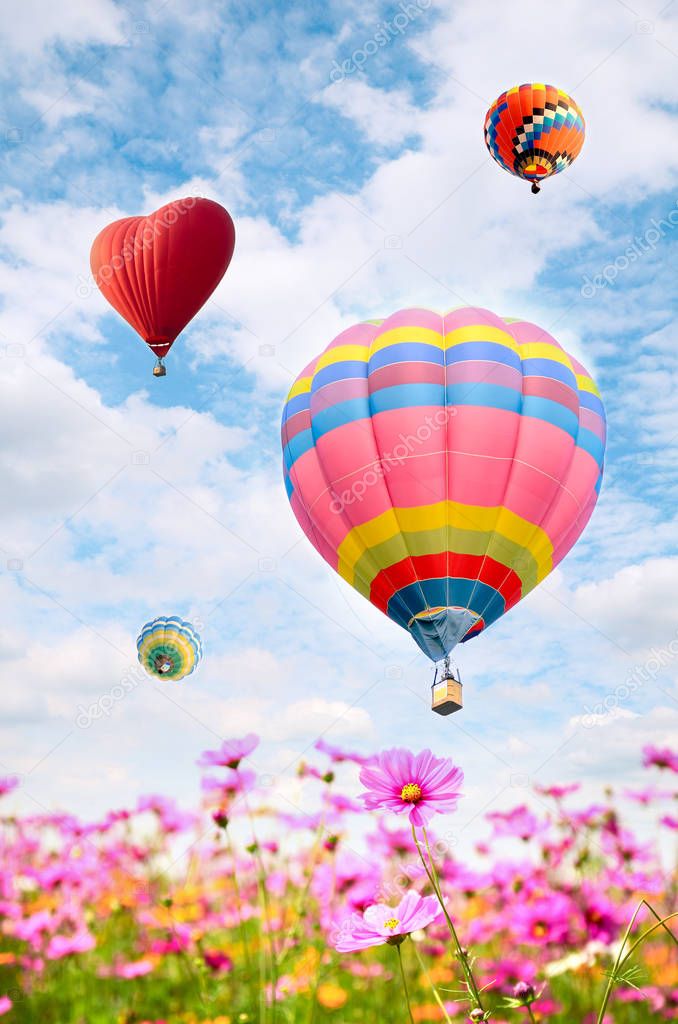 Colorful balloon over bright sky.