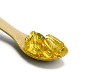 Kaşığı vitamini kapsülü.