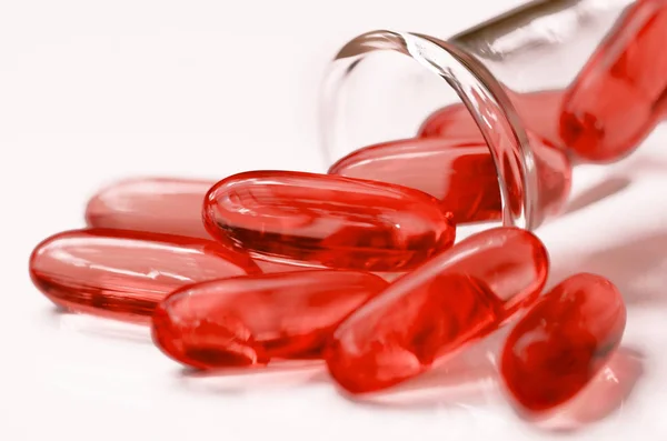 Dietary supplement in soft gelatin capsule. — Stock Photo, Image