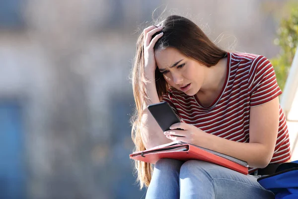 Worried Student Checking Bad News Mobile Phone Sitting Campus — Stock Photo, Image