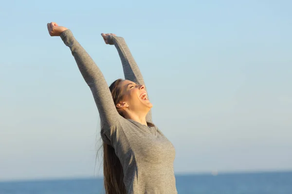 Excited Woman Celebrating Success Raising Arms Beach Sunset — Stock Photo, Image