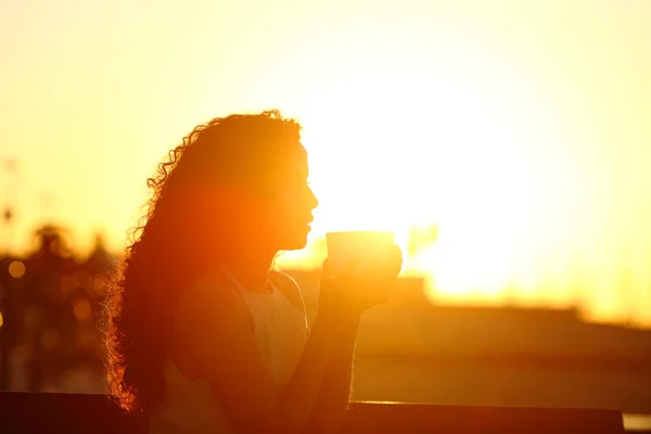 Side View Silhouette Woman Holding Coffee Mug Sitting Bench Sunset — Stock Photo, Image