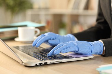 Freelance hands with defective latex gloves working clipart