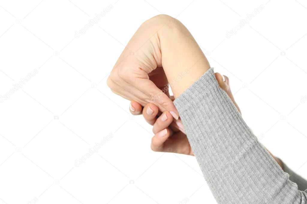 Close up of hypermobile woman hand bending wrist isolated on white background