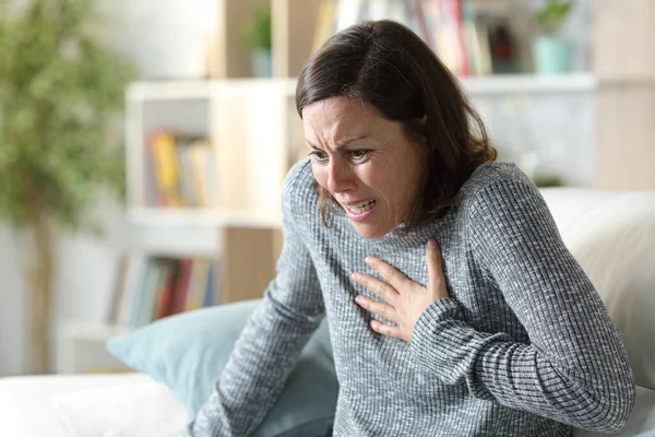 Scared Adult Woman Suffering Heart Attack Touching Chest Pain Sitting — Stock Photo, Image