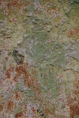 Eski paslı yıpranmış ve düzensiz taş duvar dokusu arkaplan veya arkaplan