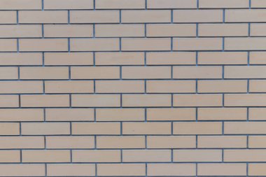Pürüzsüz düz tuğla duvar arkaplanı veya arkaplan