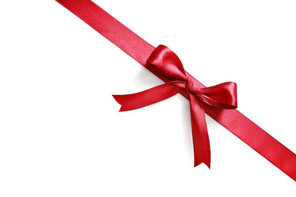 Shiny red satin ribbon and bow isolated on white background