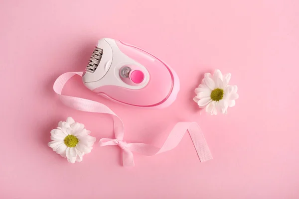 Hair remover on pink background