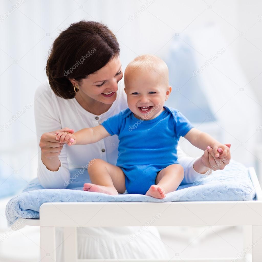 baby on changing table