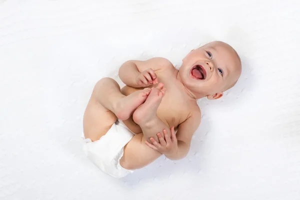Little baby wearing a diaper — Stock Photo, Image
