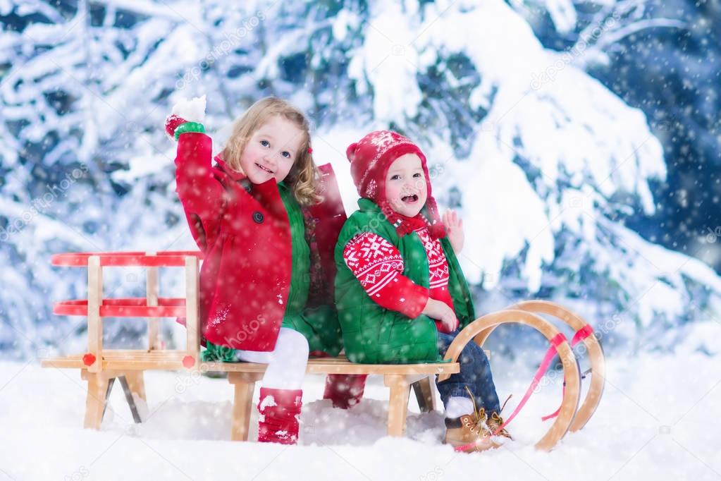 Kids enjoying sleigh ride on Christmas day