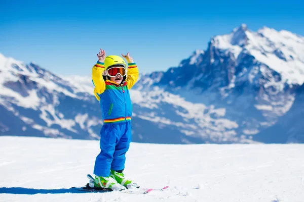 Ski and snow fun for child in winter mountains — Stock Photo, Image