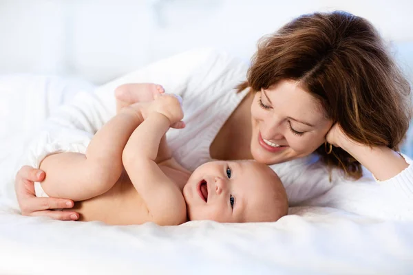 Baby and mother at home. Mom and child. Royalty Free Stock Photos