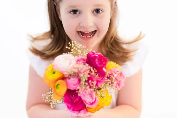 Niña con ramo de flores — Foto de Stock