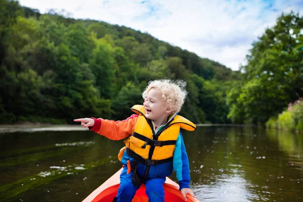 Little boy in kayak — Stock Photo, Image