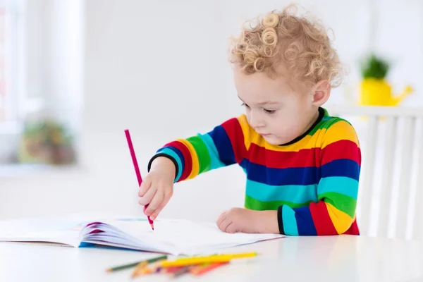 Kids read, write and paint. Child doing homework. — Stock Photo, Image
