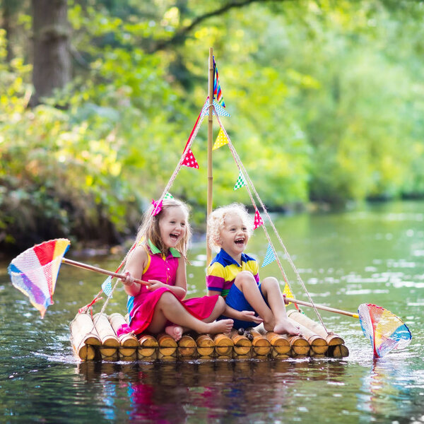 Kids on wooden raft