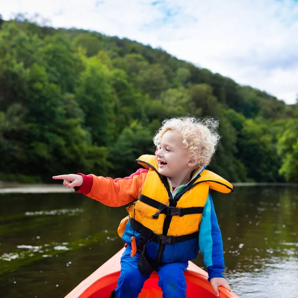 Little boy in kayak