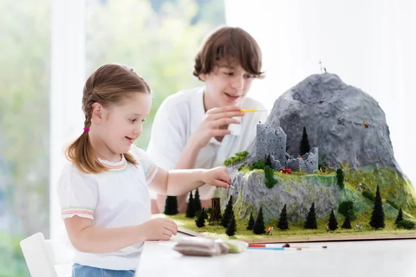 Kids working on model building project for school — Stock Photo, Image