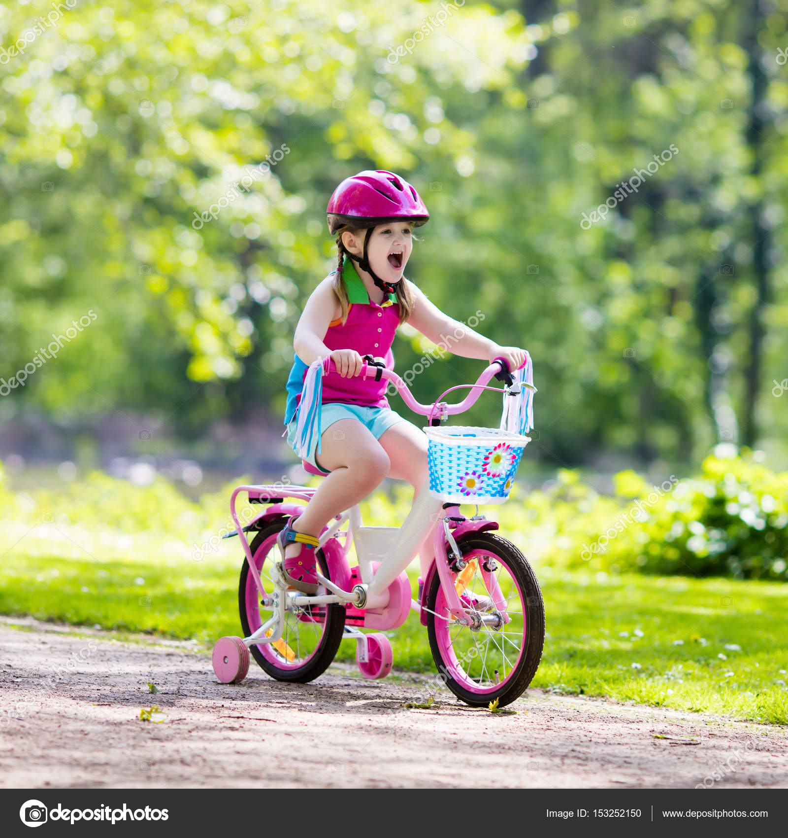 Child riding  bike  Kid  on bicycle  Stock Photo 