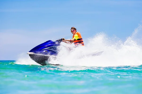 Teenager on water scooter. Teen age boy water skiing. — Stock Photo, Image