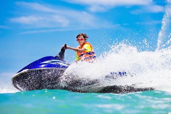 Teenager on water scooter. Teen age boy water skiing. — Stock Photo, Image