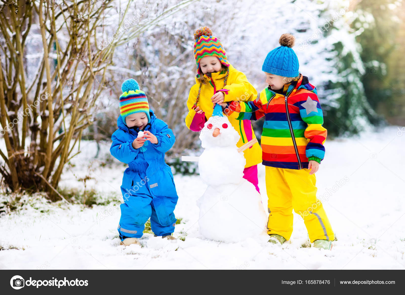 Kids building snowman. Children in snow. Winter fun. — Stock Photo