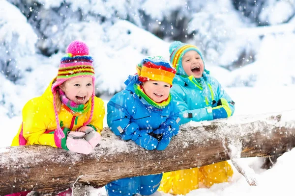 kids playing in snow