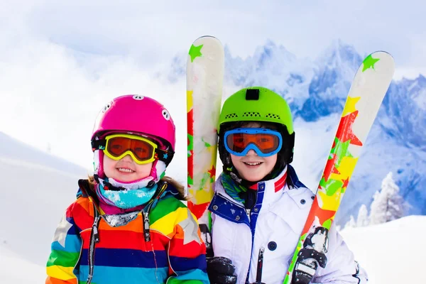 Ski and snow fun for kids in winter mountains — Stock Photo, Image