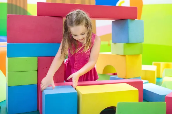 Kids play. Construction toy blocks. Child toys