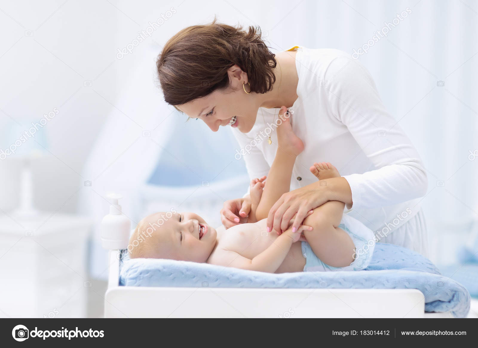 baby on changing table