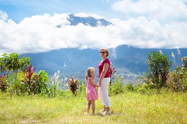 Family hiking in mountains and jungle — Stock Photo, Image