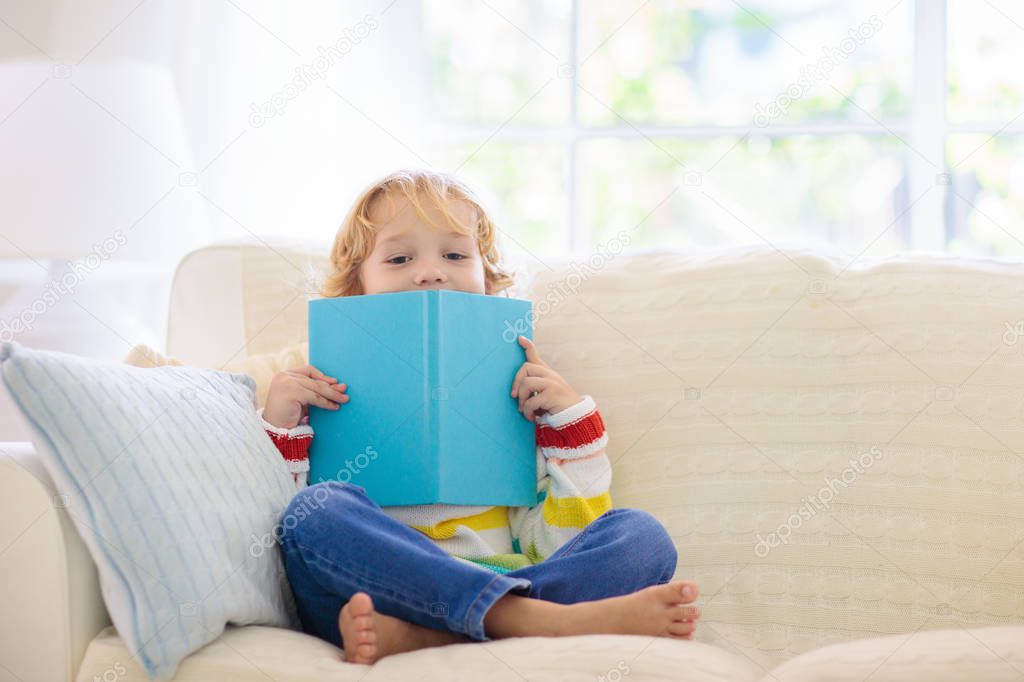 Child reading book. Kids read books.