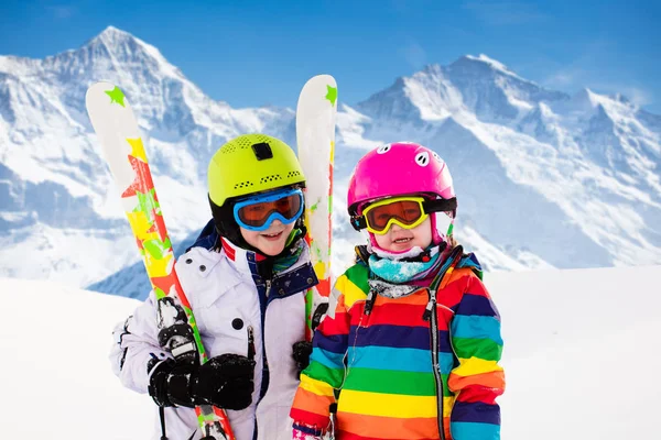 Ski and snow fun for kids in winter mountains — Stock Photo, Image