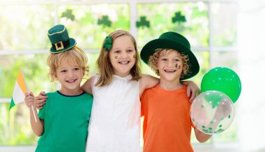 Kids celebrate St Patrick Day. Irish holiday.