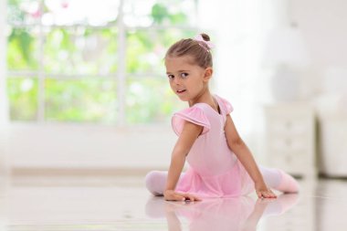 Baby ballet studio. Little ballerina in dance class. Cute girl in pink tutu and leotard learning to dance. Classic choreography for kids. Child dancer exercising. Kids practice full split.