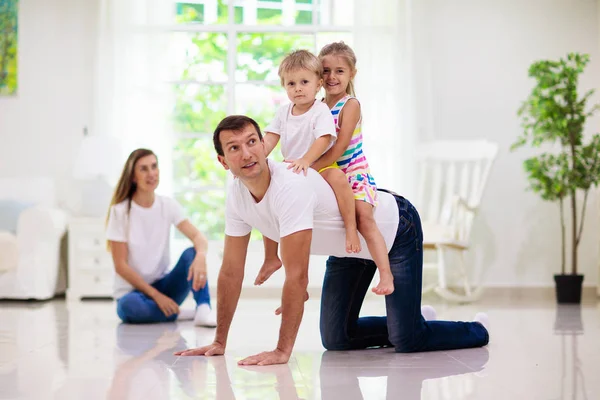 Happy Young Family Kids Home Father Mother Daughter Son Playing — Stock Photo, Image