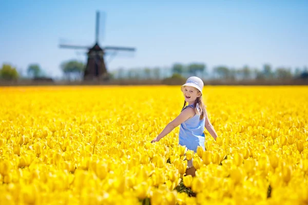 Child Tulip Flower Field Windmill Holland Little Dutch Girl White — Stock Photo, Image