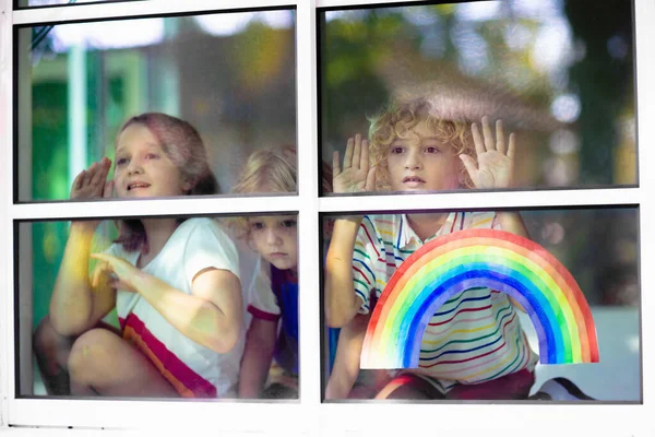 Coronavirus Quarantine Stay Home Kids Sitting Window Children Drawing Rainbow — Stock Photo, Image