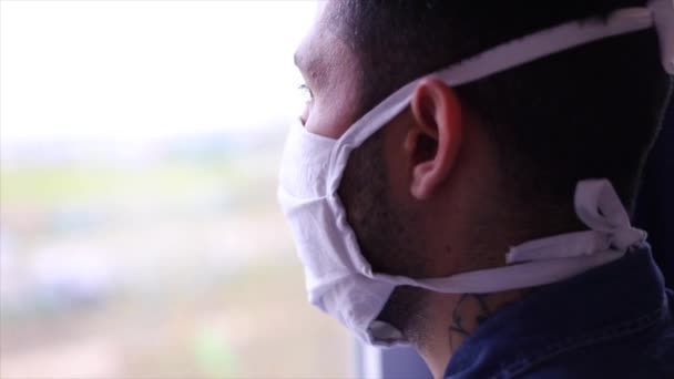 Young Man Protective Mask Interacting His Smartphone Indoors Quarantine Self — Stock Video