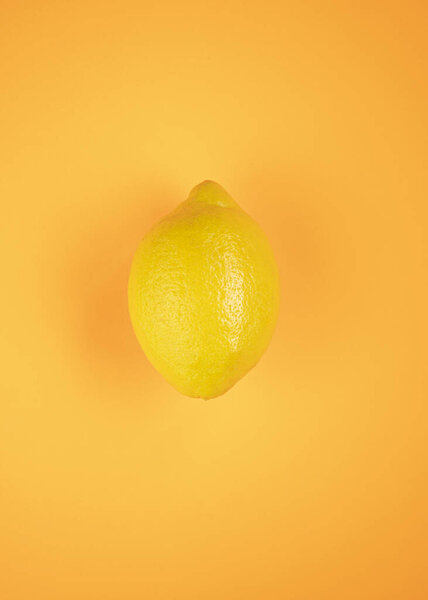 lemon, summer fruit, isolated on orange background